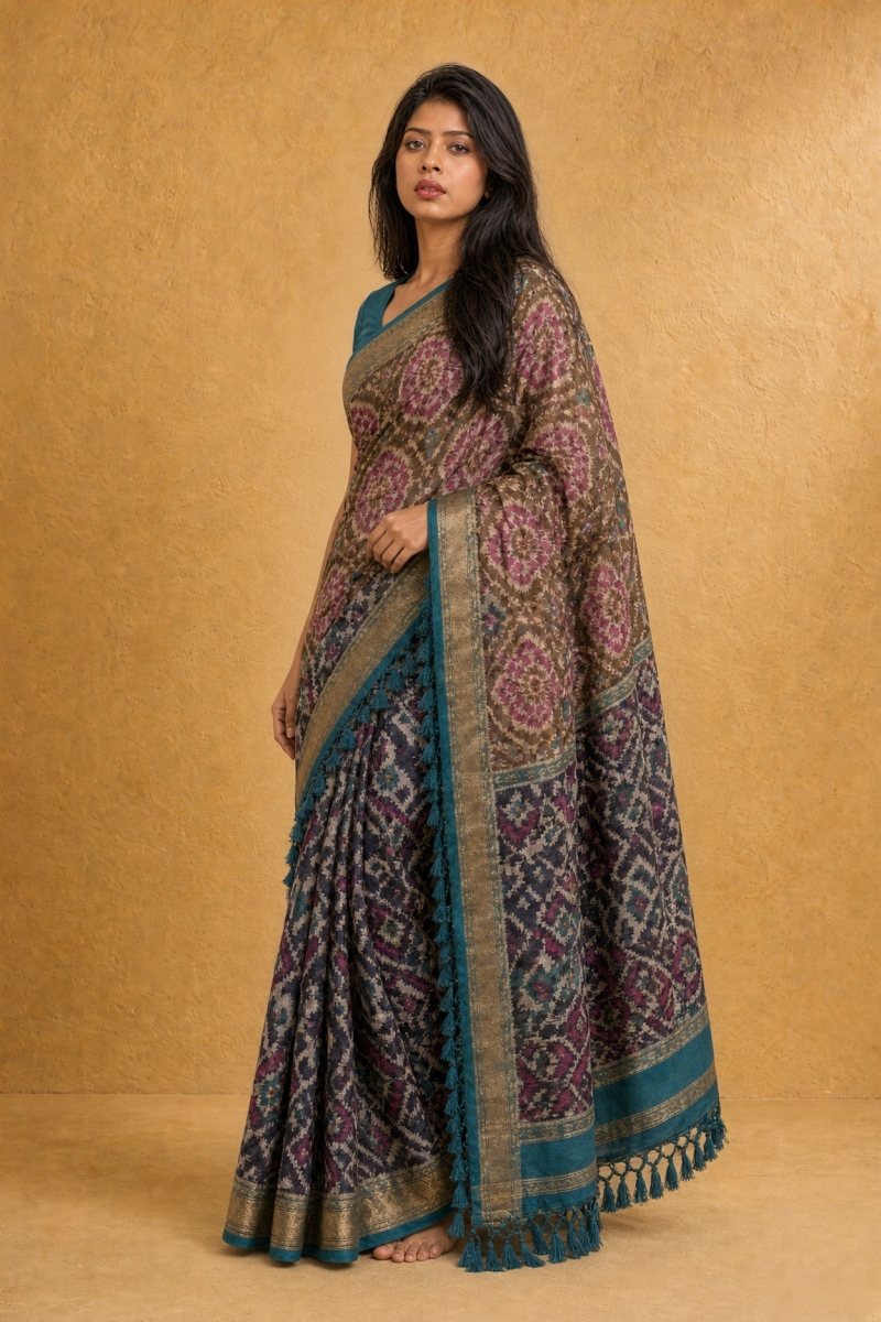 Peacock Blue and Magenta Mashru Silk Patola Saree — left three-quarter view