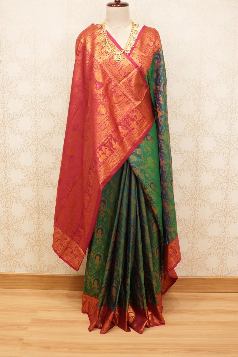 Emerald Green and Rani Pink South Silk Saree with Radha Krishna Motifs — photo 2