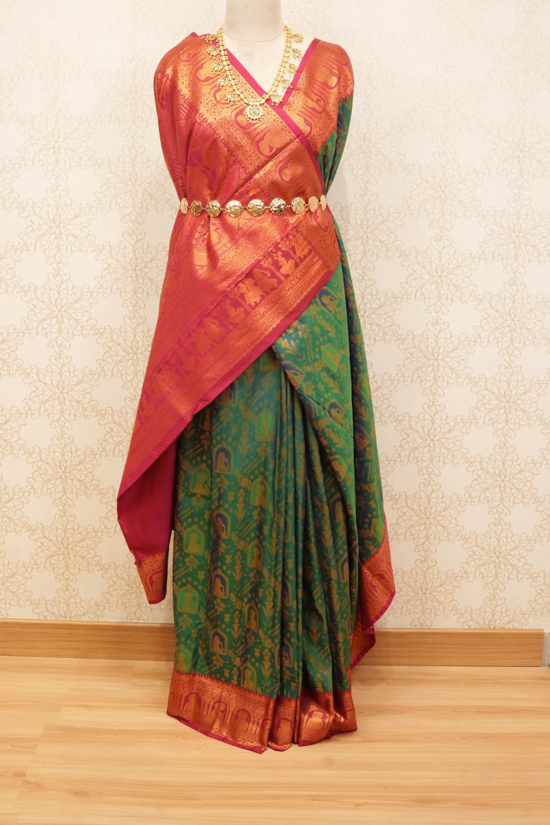 Emerald Green and Rani Pink South Silk Saree with Radha Krishna Motifs — photo 6