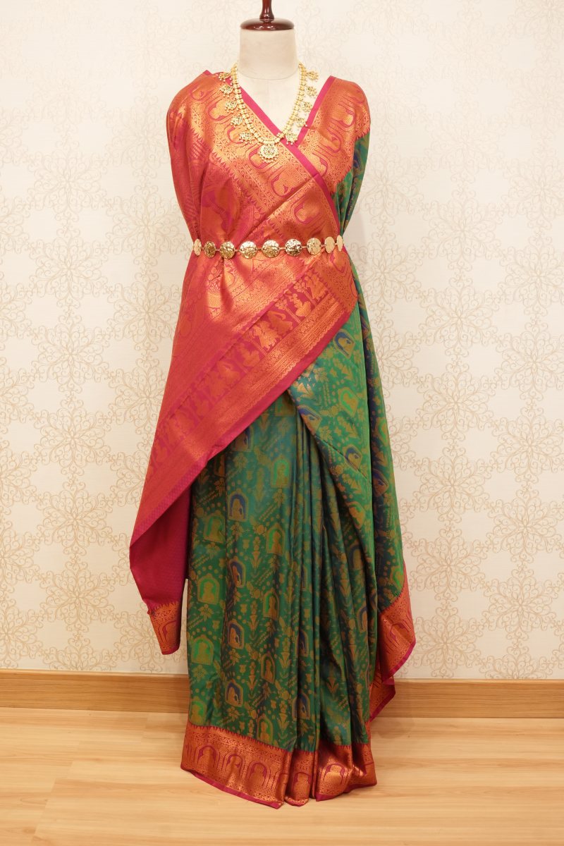 Emerald Green and Rani Pink South Silk Saree with Radha Krishna Motifs — photo 5