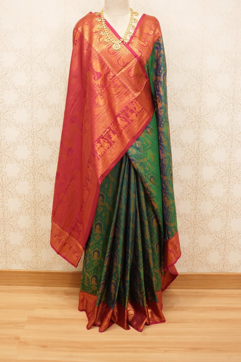 Emerald Green and Rani Pink South Silk Saree with Radha Krishna Motifs — front