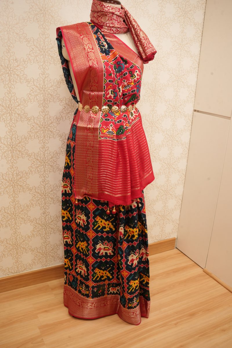 Black and Vermilion Red Dola Silk Patola Saree — photo 4